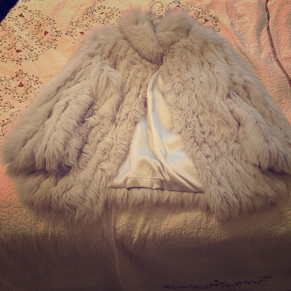 Saga Fox, white fur coat/jacket